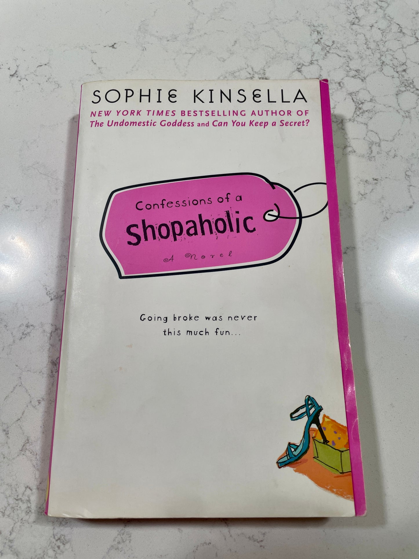 Confessions of a Shopaholic written by Sophie Kinsella