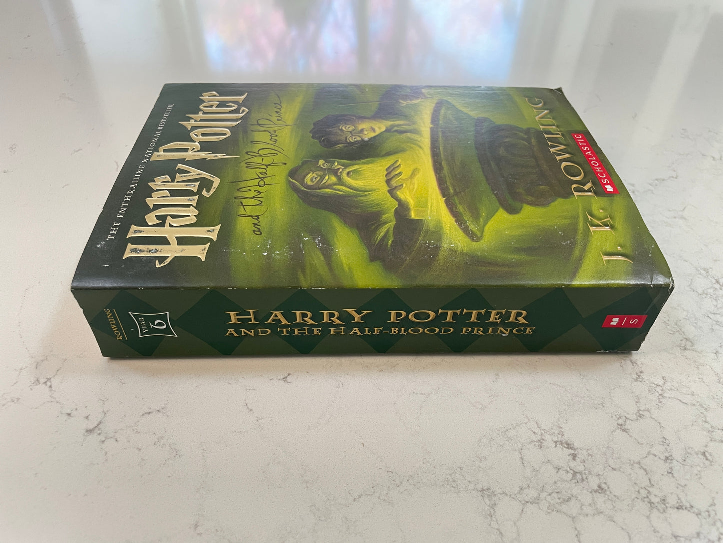 Harry Potter and the Half-Blood Prince written by J.K. Rowling