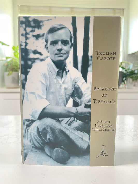 Breakfast at Tiffany's by Truman Capote (includes three short stories- House of Flowers, A Diamond Guitar, A Christmas Memory)