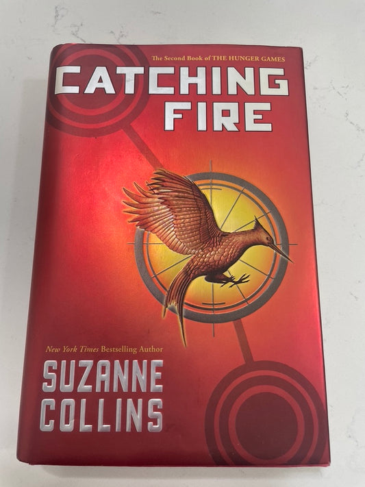 Catching Fire by Suzanne Collins (hardback cover secondhand book)