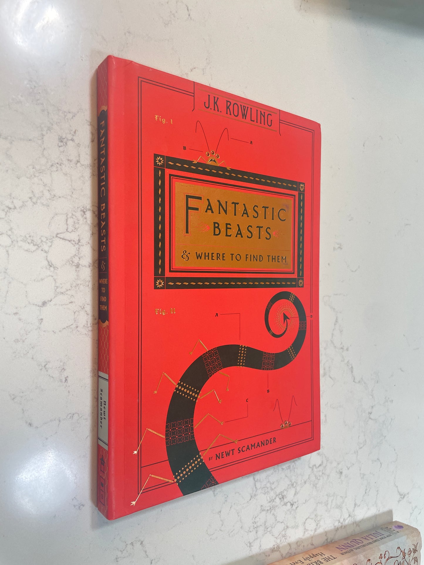 Fantastic Beasts & Where to Find Them written by J.K. Rowling