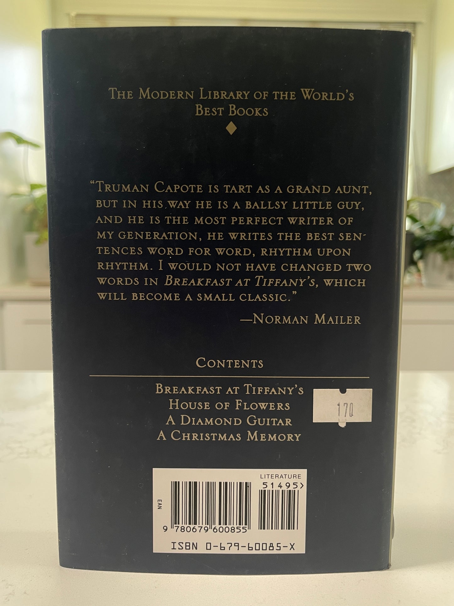 Breakfast at Tiffany's by Truman Capote (includes three short stories- House of Flowers, A Diamond Guitar, A Christmas Memory)